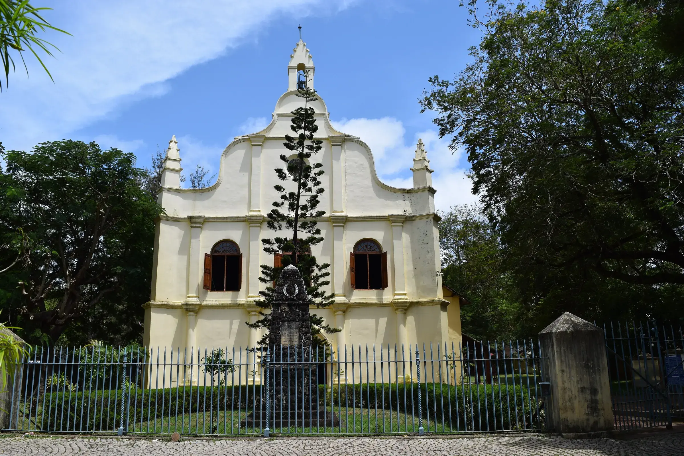 The plain whitewashed façade of St. Francis Church, Fort Kochi
