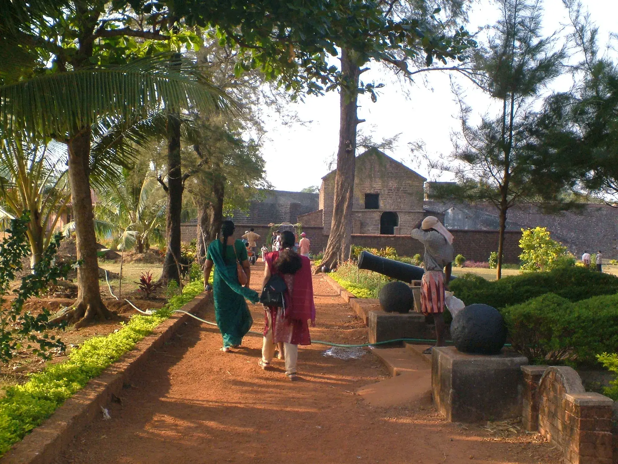 The laterite walls of St. Angelo Fort above the sea
