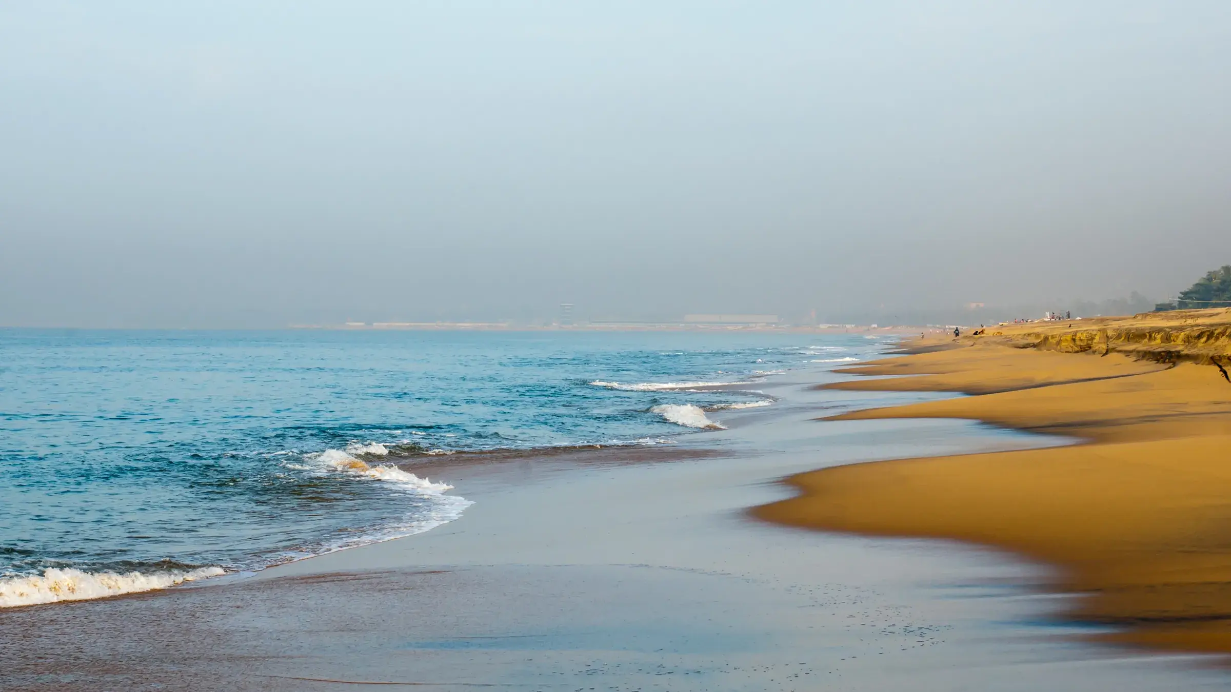 Boats and the shoreline of Kollam