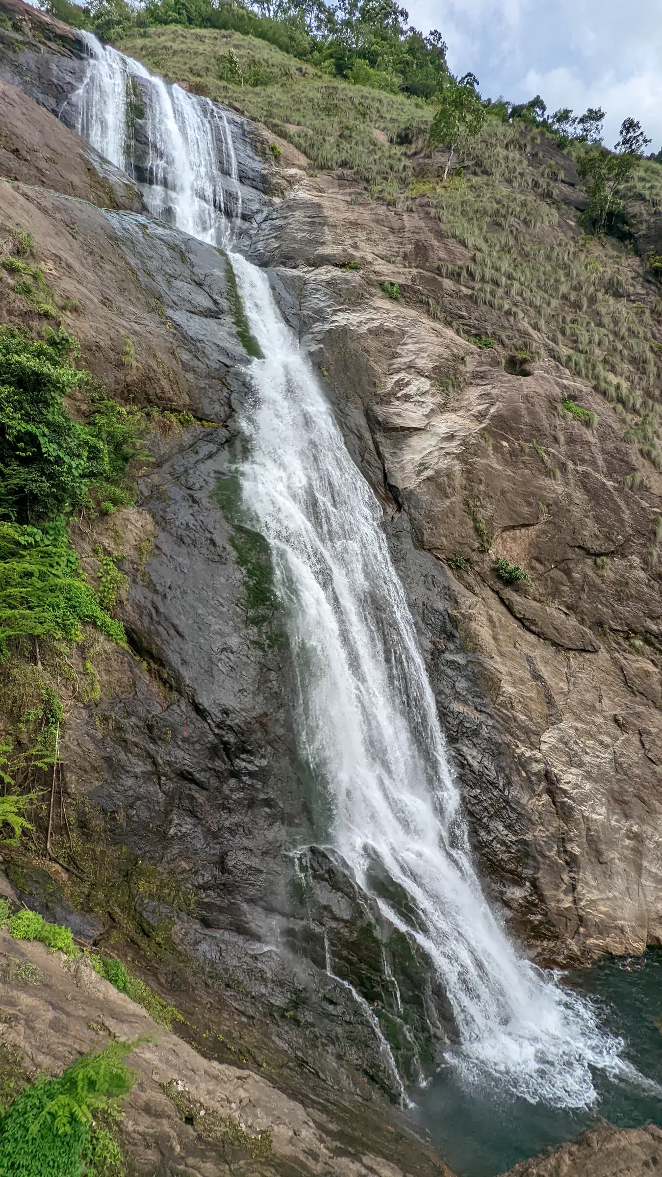 Water tumbling down the rock face at Palaruvi Falls