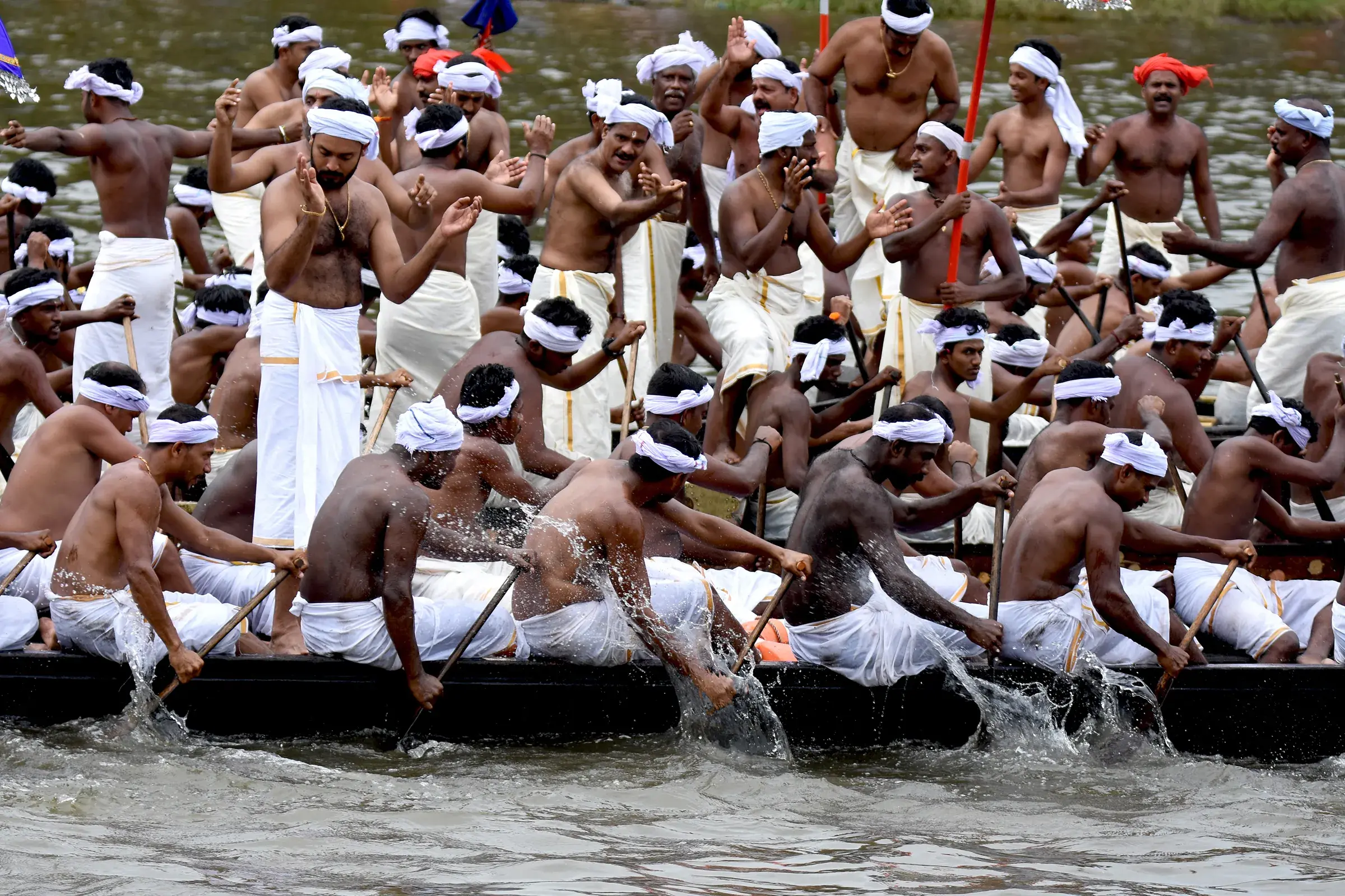 Snake boats with rows of oarsmen on the Pamba at Aranmula