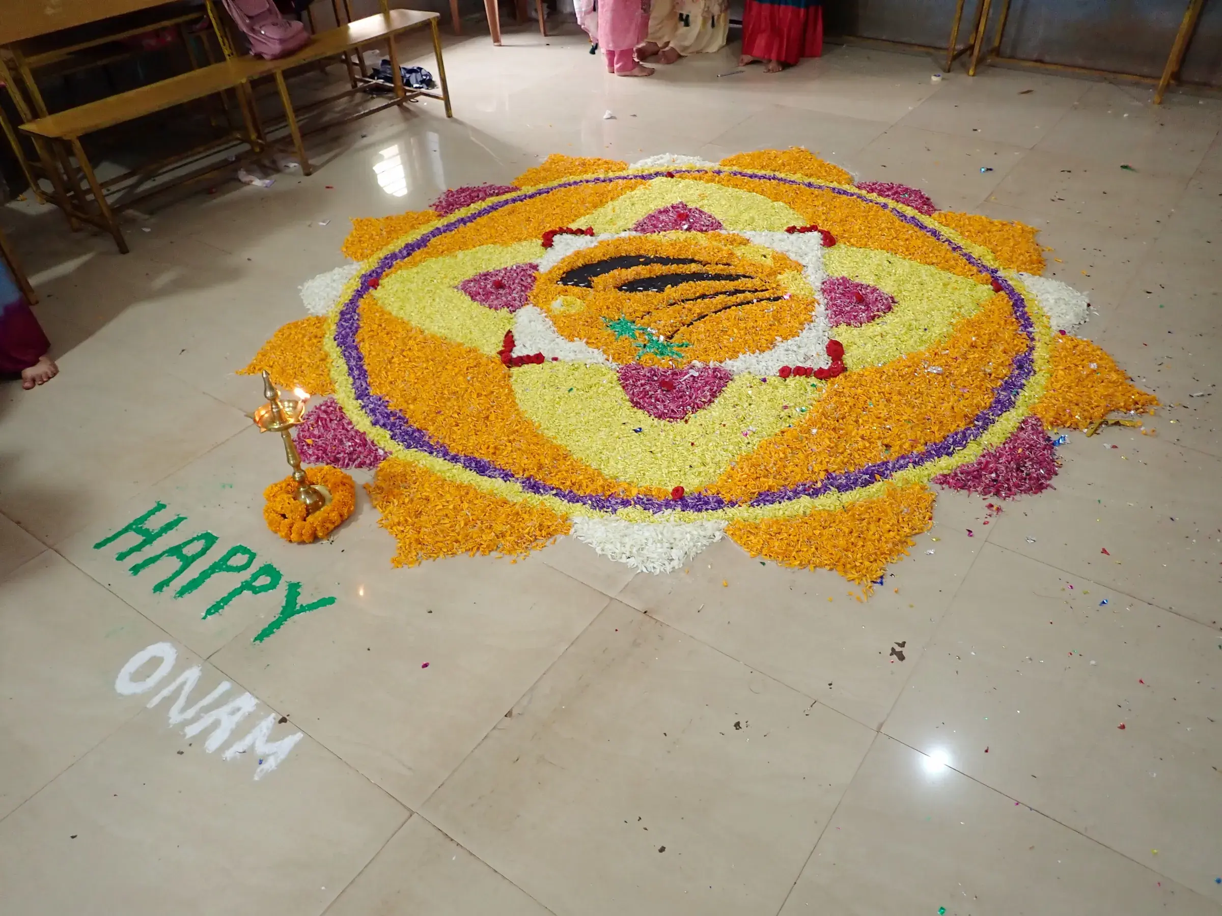 A circular flower carpet (pookalam) made for Onam