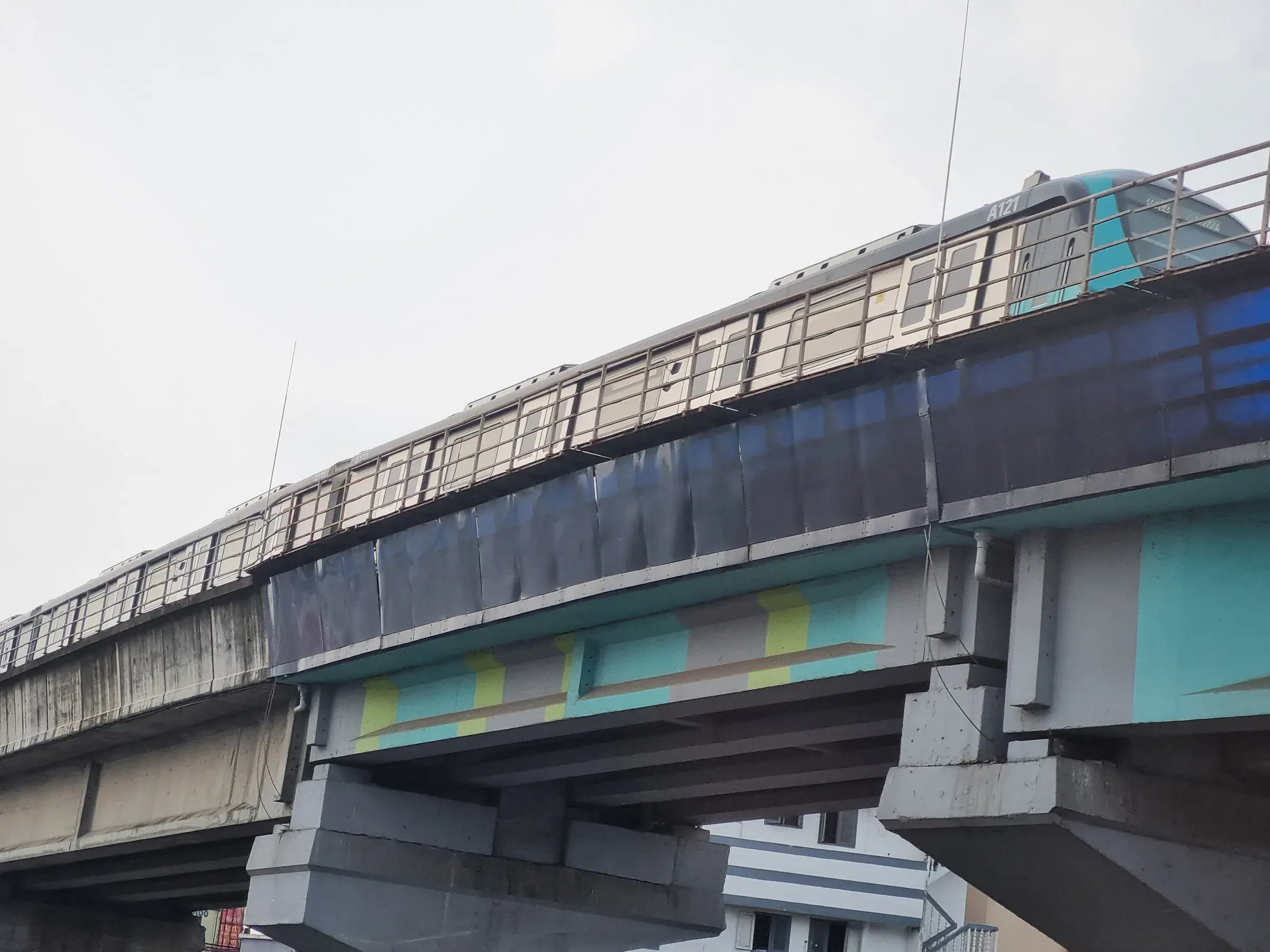 A Kochi Metro train on an elevated track